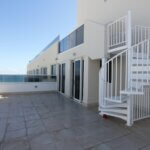 Beachfront Roof Deck with White Aluminum Stair