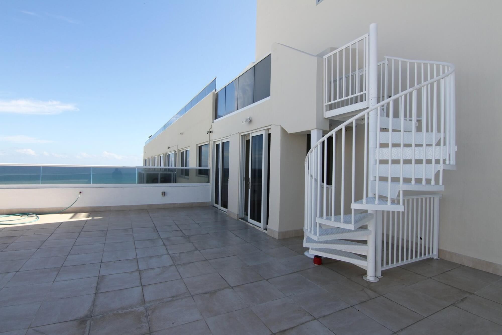 Beachfront Roof Deck with White Aluminum Stair