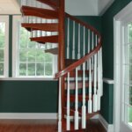 Traditional Home with dark, painted Wood Staircase