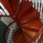 Traditional Home with dark, painted Wood Staircase