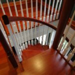 Traditional Home with dark, painted Wood Staircase