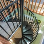 Sleek Black Steel Stair in Eclectic Home