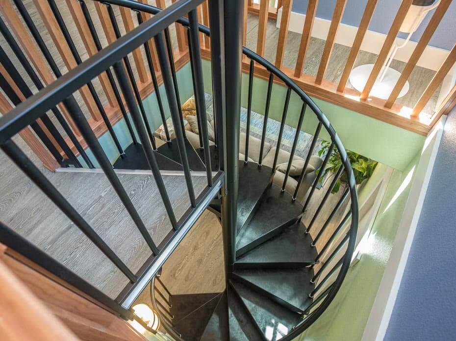 Sleek Black Steel Stair in Eclectic Home