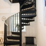 Metropolitan Home with Modern Black Staircase