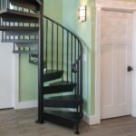 Sleek Black Steel Stair in Eclectic Home