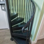 Sleek Black Steel Stair in Eclectic Home