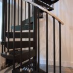 Metropolitan Home with Modern Black Staircase