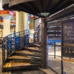 Marketplace with Ornate Custom Steel Staircase