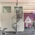 Gym with Unfinished, Steel Spiral Staircase