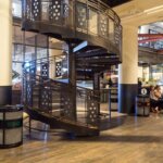 Marketplace with Ornate Custom Steel Staircase