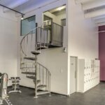 Gym with Unfinished, Steel Spiral Staircase