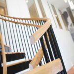 Dual Rail Black Steel Staircase with Wood Accents