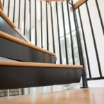 Dual Rail Black Steel Staircase with Wood Accents