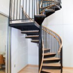 Dual Rail Black Steel Staircase with Wood Accents