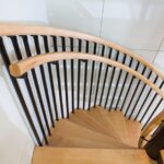 Dual Rail Black Steel Staircase with Wood Accents