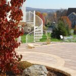 Country Patio with White Outdoor Spiral Stair