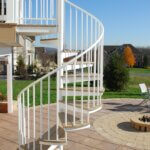 Country Patio with White Outdoor Spiral Stair