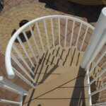 Country Patio with White Outdoor Spiral Stair