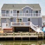 Shore Home with Two-Story, Galvanized Spiral Stair