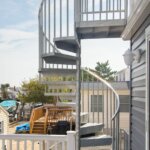 Shore Home with Two-Story, Galvanized Spiral Stair