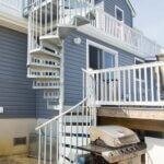 Shore Home with Two-Story, Galvanized Spiral Stair