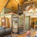 Rustic Home with Decorative, Wrought Iron Spiral Stair