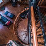 Rustic Home with Decorative, Wrought Iron Spiral Stair