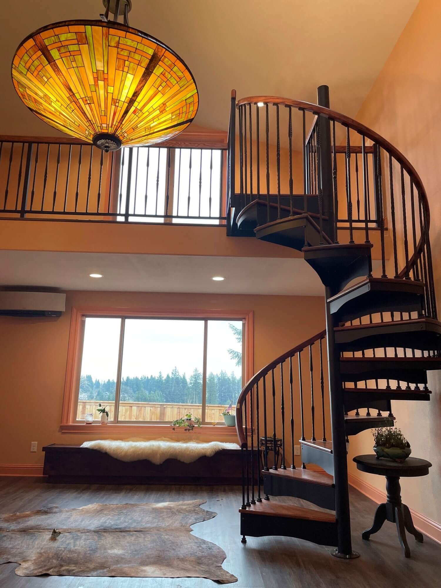 Forged Iron 5 ft code spiral stairscase red oak treads and railing
