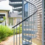 Suburban Home with Galvanized Roof Deck Staircase