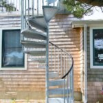 Suburban Home with Galvanized Roof Deck Staircase