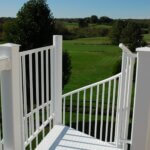 Waterfront Home with White Aluminum Deck Stair