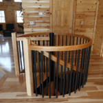 rustic spiral staircase with metal spindles