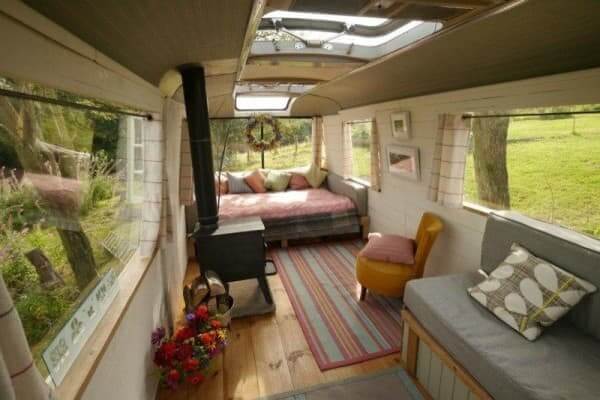 Tiny house boosts living space with motorized deck and spiral