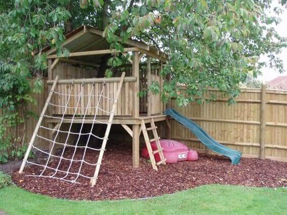 small backyard treehouse