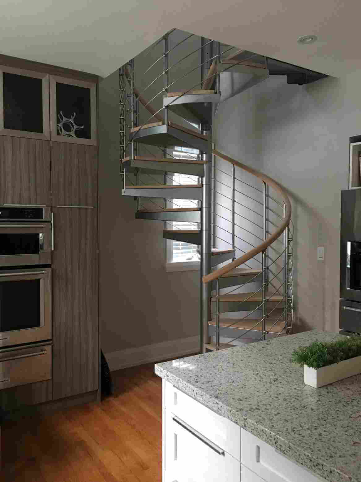 cable railing steel and wood spiral staircase