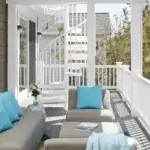 outdoor aluminum spiral stair on multilevel deck on a beach house
